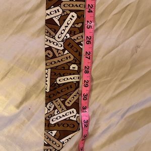 NWOT Vintage Coach thin & long Brown Scarf w variety of Coach insignia